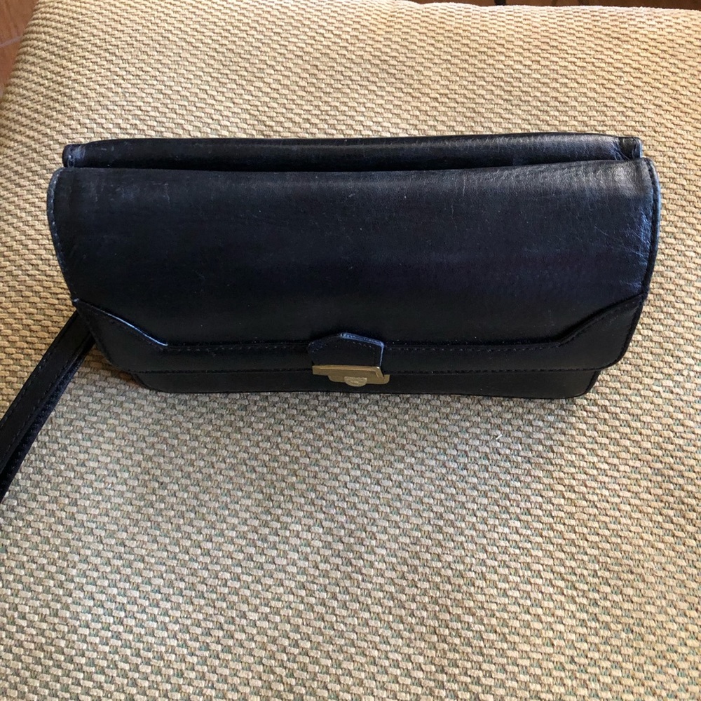 BERK DERT Black clutch bag.